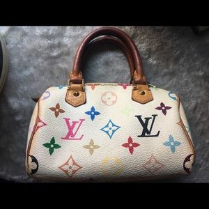 Authentic Louis Vuitton mini speedy HL 400$